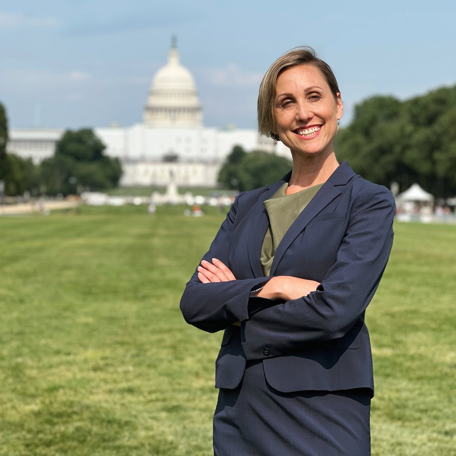 Helene Cornell on the National Mall with the U.S. Capitol behind her